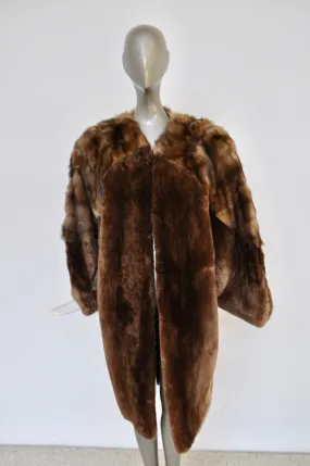 Claude Montana avantgarde sable coat with fringes 1980s