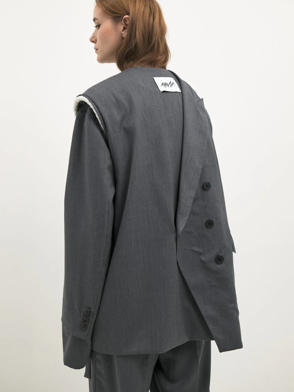 Signature off sleeve origami blazer